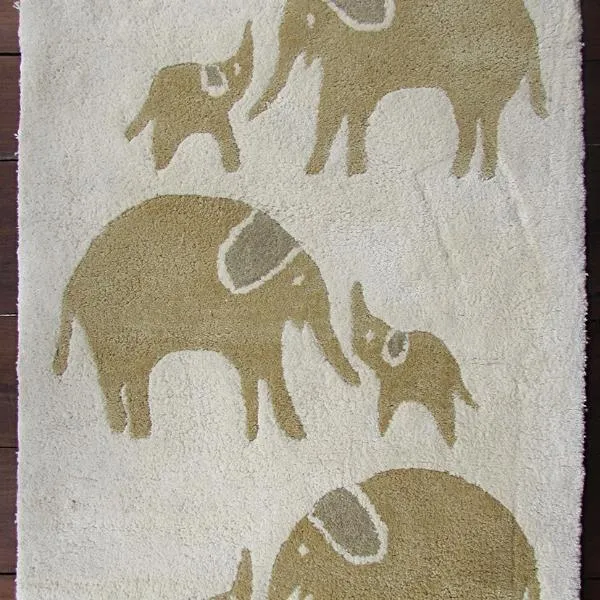 Elephant Print Organic Wool Hand Tufted Carpet Yellow